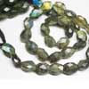 Natural Blue Fire Labradorite Faceted Oval Nuggets Beads Strand Length is 12 Inches & Sizes from 9mm to 10mm approx. 
